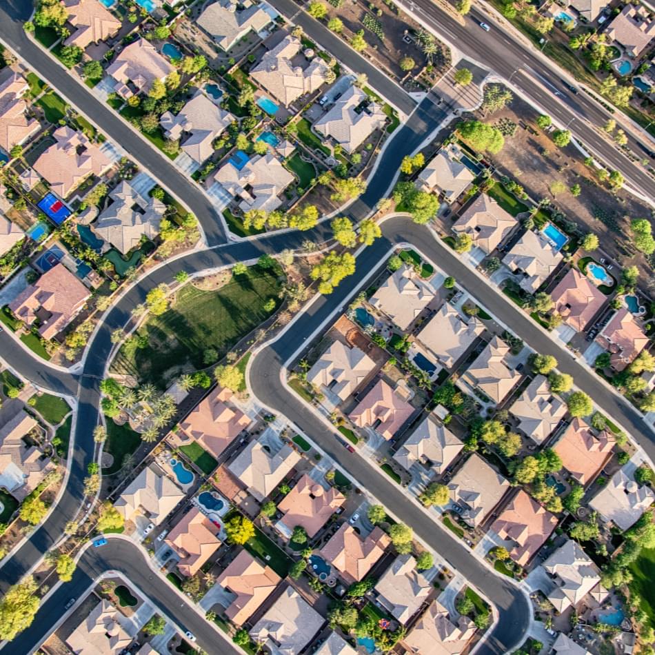 Overhead view of a sprawling housing development.